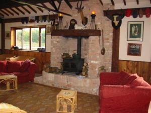 Our Old Barn, with log burning stove!
